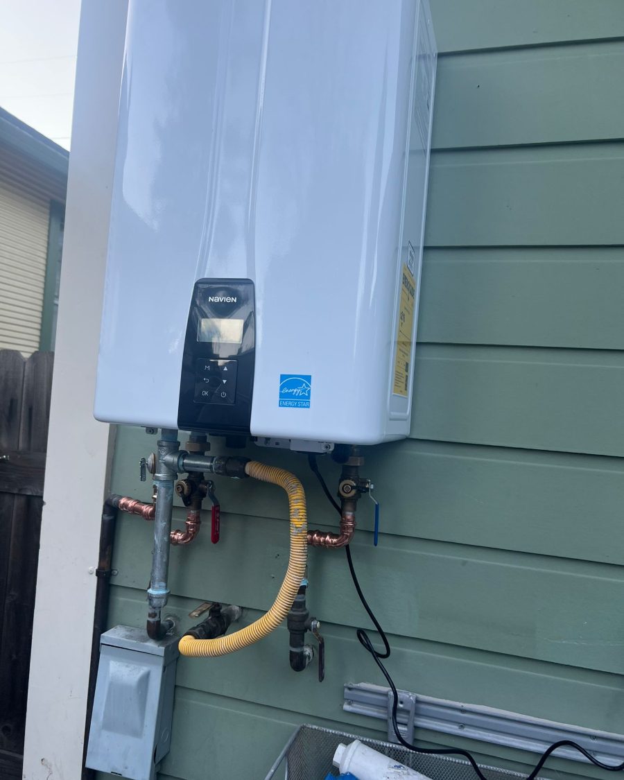 Exterior tankless with new gas line by Apex Plumbing